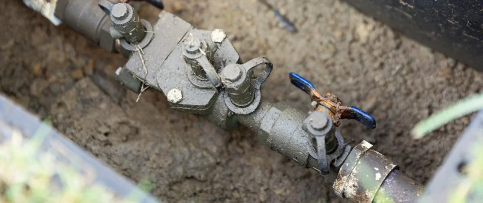 Backflow regulator of an irrigation system in Cary, NC.