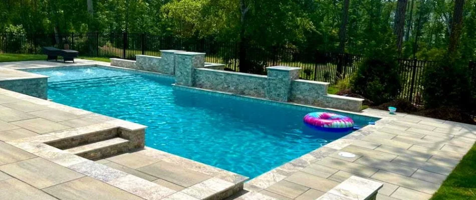 Pool in Durham County, NC, with paver decking and a float.